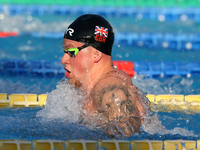 Adam Peaty (ENG) competing in Men's 100 m Breaststroke Final A and setting the new record of the competition during the international swimmi...