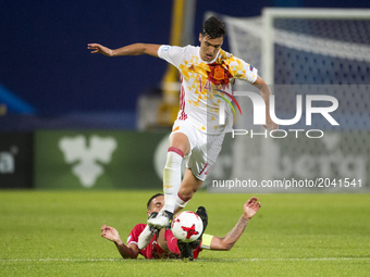 Mikel Merino of Spain tackled by Uros Djurdjevic of Serbia during the UEFA European Under-21 Championship 2017 Group B match between Serbia...
