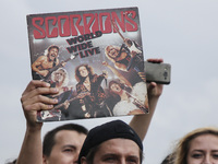 A fan holds German band Scorpions LP during German band Scorpions the Walk of Fame Star Unveiling ceremony in Krakow, Poland on  23 June, 20...