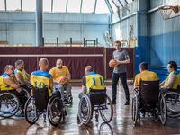 Players of Kyiv BASKI wheelchair basketball team start their training at the sports center Voskhod in Kyiv, Ukraine. The team was created 3...