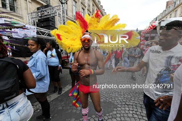 Costumed participant take part in the annual Gay Pride homosexual, bisexual and transgender visibility march on June 24, 2017 in Paris. 