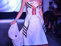 A Model presents a creation of a Designer during the Nagaland Fashion Week in Dimapur, India north eastern state of Nagaland on Saturday, 24...