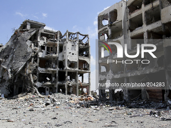 The rubble of destroyed apartments in a buildings hit by an Israeli strike in Beit Lahiya, northern Gaza Strip on Aug 4, 2014. (