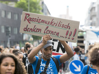  demonstrate against racism towards black people in Berlin, Germany on June 24, 2017. (