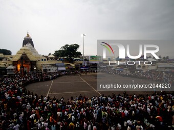 Devotees gathered in front of the Shree Jagannath temple as they arrives to participate ditties annual rath yatra festival or chariot festiv...
