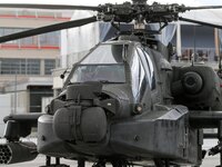 A US AH-64D Apache Longbow helicopter on the tarmac on the last day of the International Paris Air Show at Le Bourget Airport, near Paris, o...