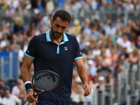 Croatia's Marin Cilic returns against Spain's Feliciano Lopez during the men's singles final tennis match at the ATP Aegon Championships ten...