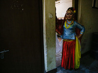 Nepalese transgender gets ready back stage for the first national dance competition for transgender in Kathmandu, Nepal on June 25, 2017. Th...