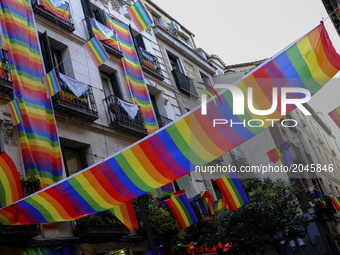 One rainbow flag in Madrid's Chueca district on June 25, 2017 during the WorldPride 2017. Some three million revellers are expected in the S...