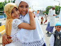 Indian Muslim Children's personnel exchange Eid greetings to one another after offering Eid al-Fitr prayers on June 26,2017  in Kolkata ,Ind...