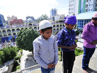 Nepalese Muslim kids offering Ritual Prayer during celebration of Eid al-Fitr at Kashmiri Takiya Jame mosque at Kathmandu, Nepal on Monday,...