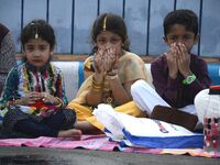 Indian Muslim child devotees  offering the Eid al Fitr prayers at Red Road in Kolkata, India on Monday, 26th June , 2017. Muslims around the...