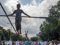 The celebration of Eid Started with a local boy performing street circus,Kolkata.India.26.6.2017. (
