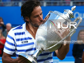 Feliciano Lopez (ESP) with Trophy after  during Men's Doubles  Final match on the day  seven of the ATP Aegon Championships at the Queen's C...