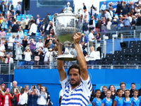 Feliciano Lopez (ESP) with Trophy after  during Men's Doubles  Final match on the day  seven of the ATP Aegon Championships at the Queen's C...