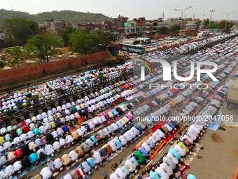 Indian Muslims offer  Eid al-Fitr prayers at the Idgah Mosque in Delh-Jaipur Highway,Rajasthan  India, Monday, June 26, 2017. Eid al-Fitr ma...