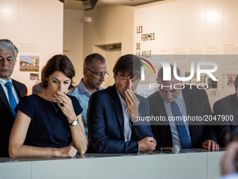 French Minister of Ecological and Inclusive Transition Nicolas Hulot (C) visits the new district of Confluence in Lyon on June 26, 2017. - (