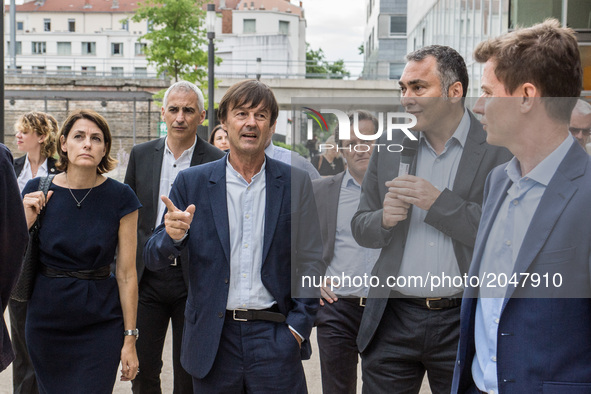 French Minister of Ecological and Inclusive Transition Nicolas Hulot visits the new district of Confluence in Lyon on June 26, 2017.  
