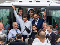 Mayor of the 4th district of Lyon David Kimelfeld (R) and French Minister of Ecological and Inclusive Transition Nicolas Hulot (C) greet peo...