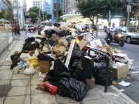 10.000 short contract municipal workers are protesting with a continuous strikes for more than a week, leaving the whole country's garbage o...