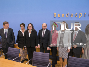 Chancellor candidate and chairman of Social Democratic Party (SPD) Martin Schulz (C) and SPD members of the goverment arrive at a news confe...