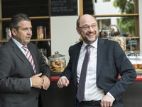 Chancellor Candidate and chairman of the Social Democratic Party (SPD) Martin Schulz (R) chats with foreign minister Sigmar Gabriel (L) afte...