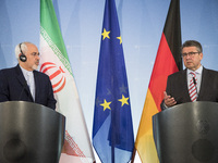 German Vice Chancellor and Foreign Minister Sigmar Gabriel (R) and Iranian Foreign Minister Mohammad Javad Zarif (L) hold a news conference...