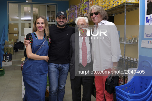 José Mercé, Emiliano Suárez and Carola Baleztena pay a visit to the food bank of Messengers of Peace in Madrid. Spain. June 27, 2017 