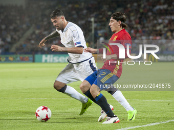Hector Bellerin of Spain and Andrea Petagna of Italy during the UEFA European Under-21 Championship Semi-Final match between Spain and Italy...