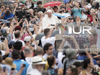 Pope Francis arrives for his weekly general audience, in St.Peter's Square, at the Vatican, Wednesday, June 28, 2017. (