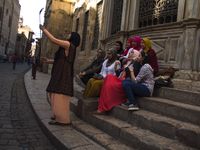 A grupe of women takes a selfie in Khan el-khalili district in Cairo on June 13, 2017 (