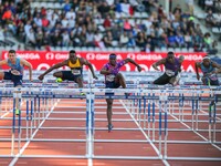 Ronald Levy (2nd L) of Jamaica, Omar Mc Leod (3th L) and Hansle Parchment (4th L) of Jamaica compete during the men's 110 meters hurdles wit...