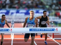 France's Kevin Mayer (C) wins the 110 meters hurdles event within the International Association of Athletics Federations (IAAF) Diamond Leag...