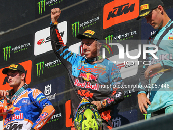 Antonio Cairoli #222 (ITA) in KTM of Red Bull KTM Factory Racing (C) celebrate on the podium after win the MXGP World Championship 2017 Race...