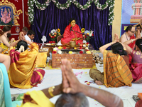 Devotees of Her Holiness Amma Sri Karunamayi performs special prayers during the Homa (sacred fire ceremony) at the Bhuvaneswari Amman Templ...