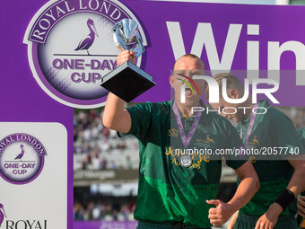 Nottinghamshire's Luke Fletcher with the winner Trophy 
during the Royal London One-Day Final match between Nottinghamshire and Surrey at  L...