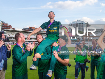 Nottinghamshire's Chris Read is lifted by teammates as the celebrate 
during the Royal London One-Day Final match between Nottinghamshire an...