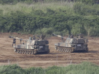 South Korean army's K-9 self-propelled howitzers move during an annual exercise in Paju, near the border with North Korea, South Korea, Tues...