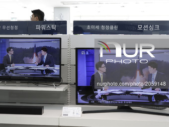 TV screens at a Uijeongbu Electronic shop show a North Korean newscaster reading a public announcement at in Gyeongigi province, South Korea...