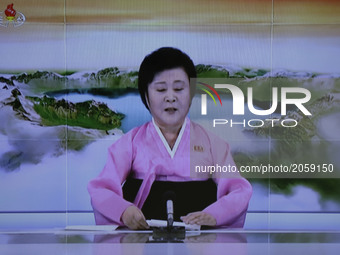 In this image made from video of a news bulletin Tuesday, July 4, 2017, North Korea's KRT television shows a presenter announcing North Kore...