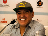 Former Argentine football player Diego Armando Maradona gestures during a press conference at Villa D’ Angelo to present the public event “E...