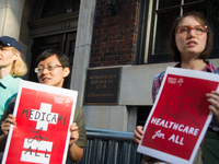 A small group of activists rally against the GOP health care plan outside of the Metropolitan Republican Club, July 5, 2017 in New York City...