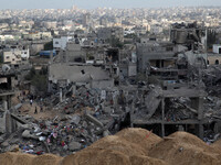 


Palestinians inspect the destroyed homes east of Gaza City  in Gaza City, Wednesday, Aug. 6, 2014. A cease-fire between Israel and Hamas...