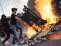 Protesters set fire on barricade during riots in St. Pauli district during G 20 summit in Hamburg on July 8, 2017 . Authorities are braced f...