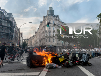 A barricade is burning in a street, in Hamburg, Germany, on July 7, 2017. In the evening there was a lot of riots in the Schanzenviertel aro...