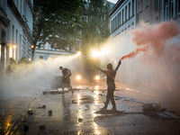 Anti-G20 Summit protesters during clashes with riot police on July 7, 2017 in Hamburg, Germany. Authorities are braced for large-scale and d...