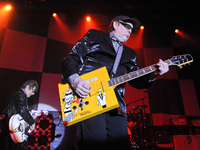 Tom Petersson (L) and Rick Nielsen perform with Cheap Trick at Emo's on May 16, 2014 in Austin, Texas. (
