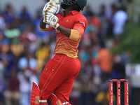 Zimbabwe cricketer Solomon Mire plays a shot during the 4th One Day International cricket matcth between Sri Lanka and Zimbabwe at 
Mahinda...