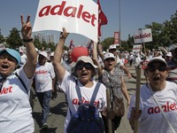 Supporters of Turkey's main opposition Republican People's Party (CHP) gather during a rally in the Maltepe district of Istanbul on July 9,...