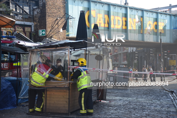 The aftermath of Camden Market's fire is seen in London on July 10, 2017. A fire has flamed into 'Camden Guitars' shop in the London's iconi...